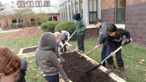 5th graders planting perennial bulbs 